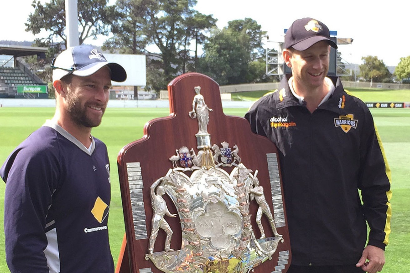 Either Victorian skipper Matthew Wade (left) or West Australian captain Adam Voges will lift the Shield at the end of today's play.
