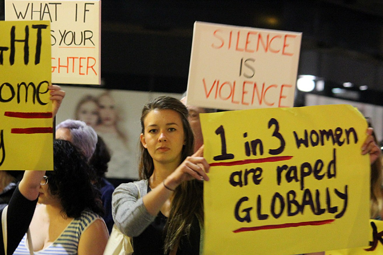 Protesters call for an end to sexual violence at the Reclaim the Night rally. Photo: AAP