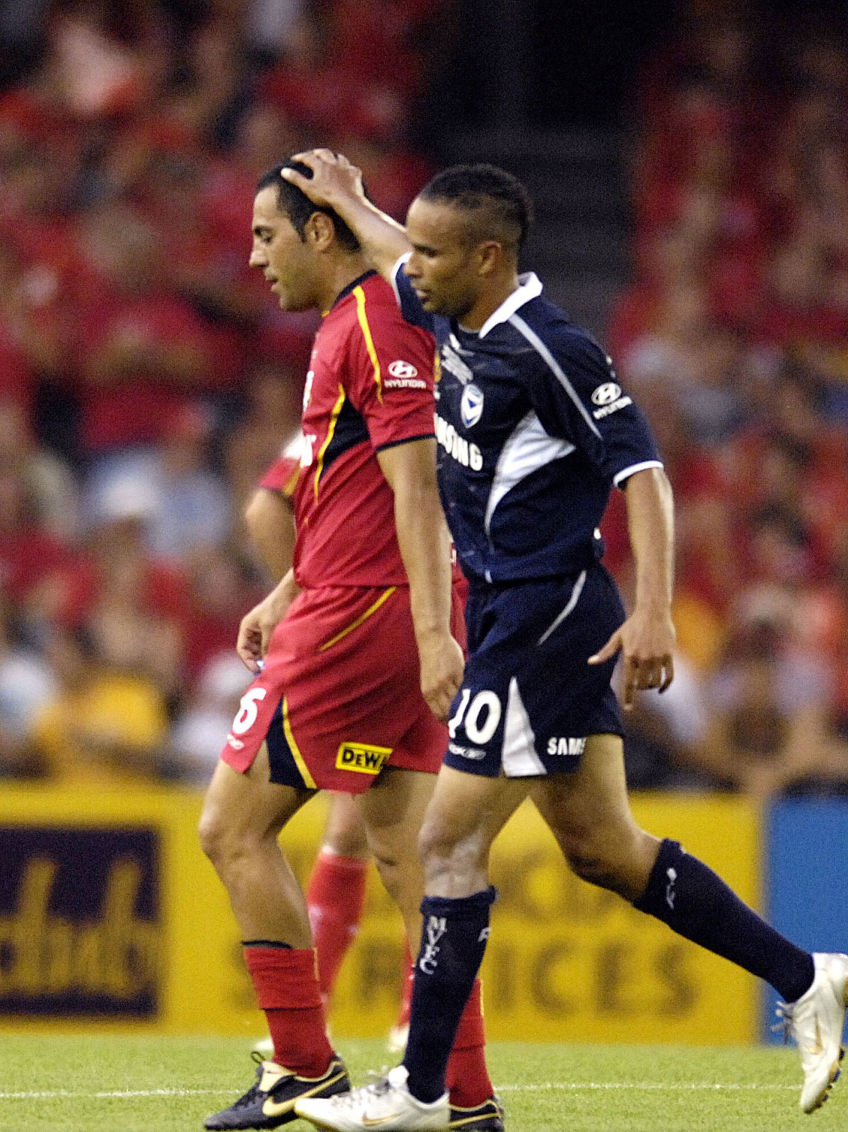 Archie Thompson farewells red-carded Ross Aloisi during United's disastrous 2007 grand final showing. AAP image 