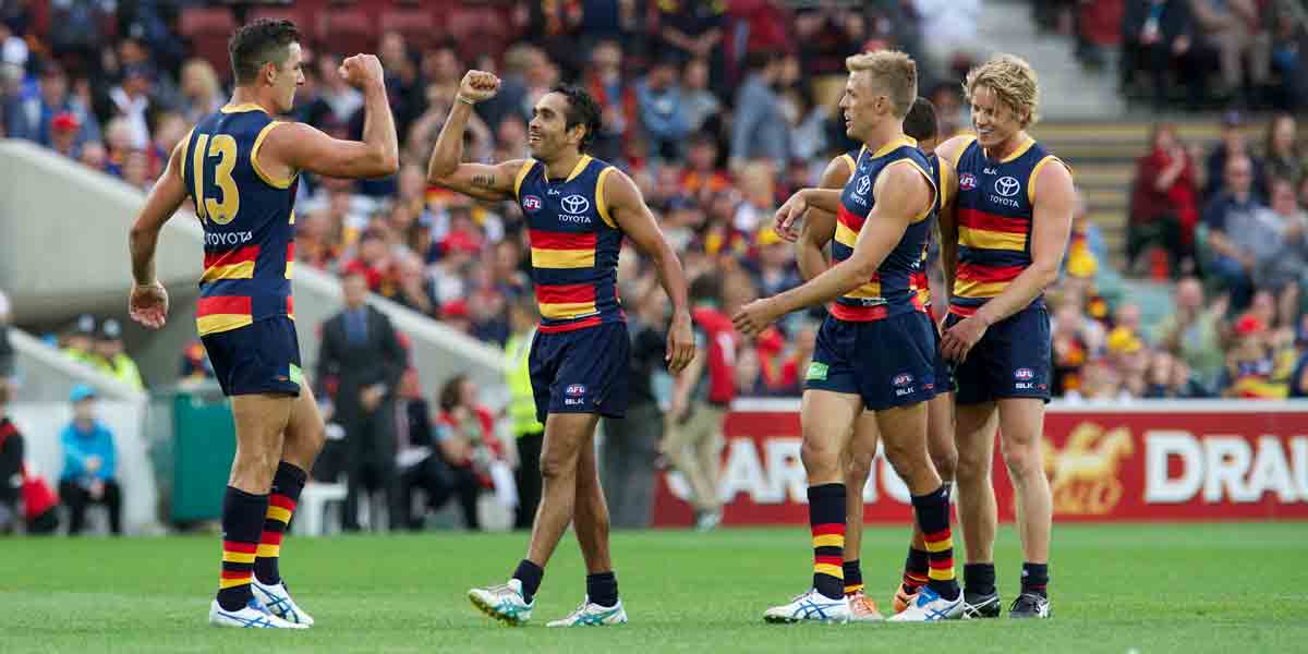 Taylor Walker and Eddie Betts celebrate their joint 10-goal haul at the end of the game. Photo: Michael Errey/InDaily