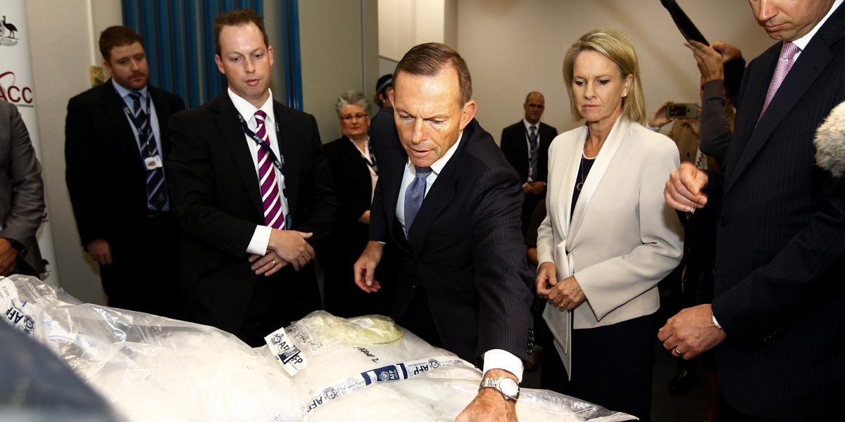 Prime Minister Tony Abbott inspects seized drugs after announcing his Ice taskforce in April. AAP photo