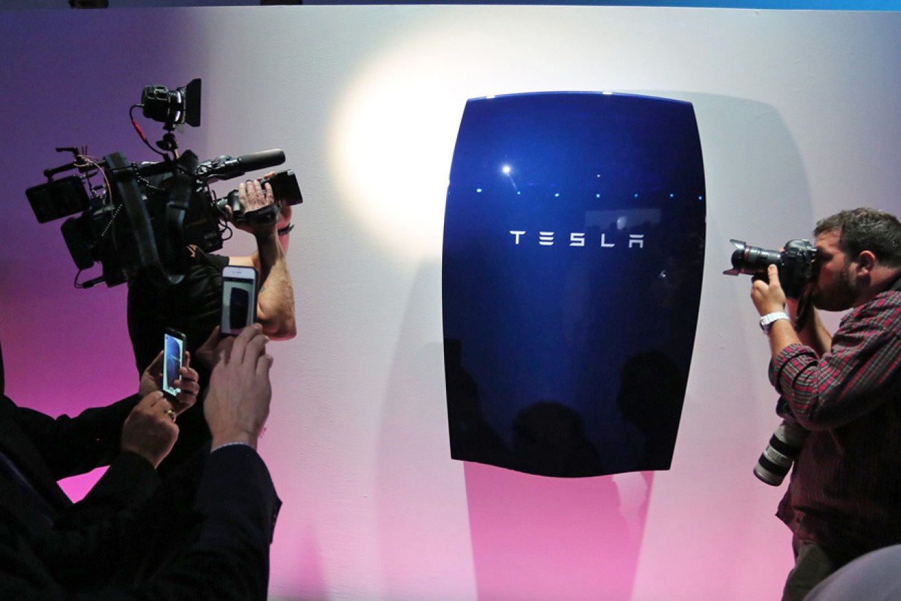 Photographers capture a Tesla Powerwall battery at the Tesla Design Studio in California.