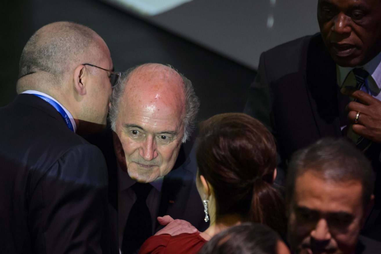 FIFA President Sepp Blatter listens to a guest after the opening ceremony of the 65th FIFA Congress in Zurich.