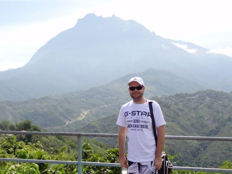 Standing in front of Mt Kinabalu