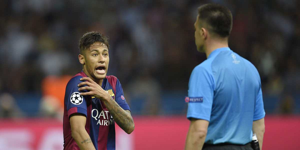 Barcelona forward Neymar da Silva Santos Junior remonstrates with referee Cuneyt Cakir after his goal was disallowed. AFP photo