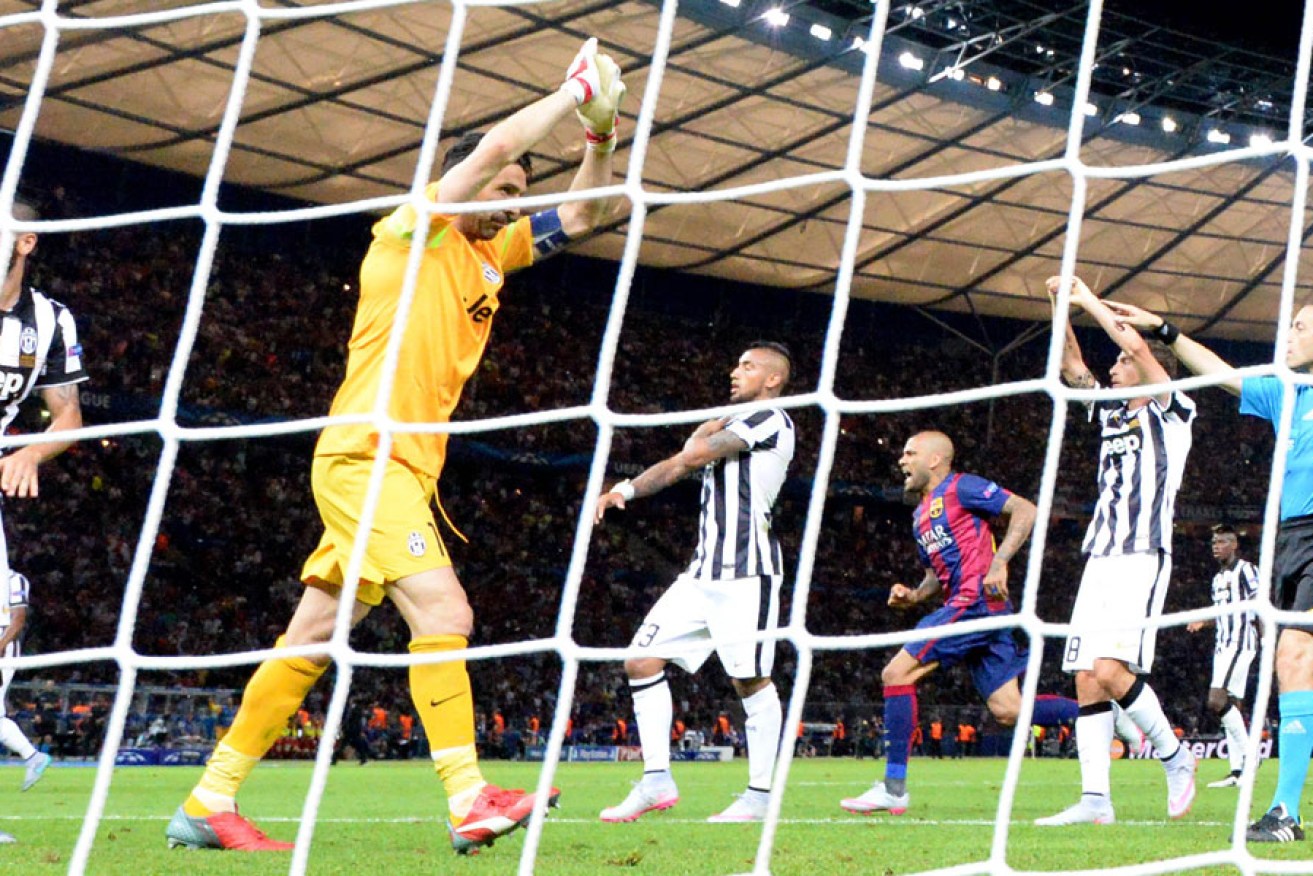 Juventus players claim handball after Barcelona's forward Neymar hit the back of the net during the recent UEFA Champions League Final. AFP photo