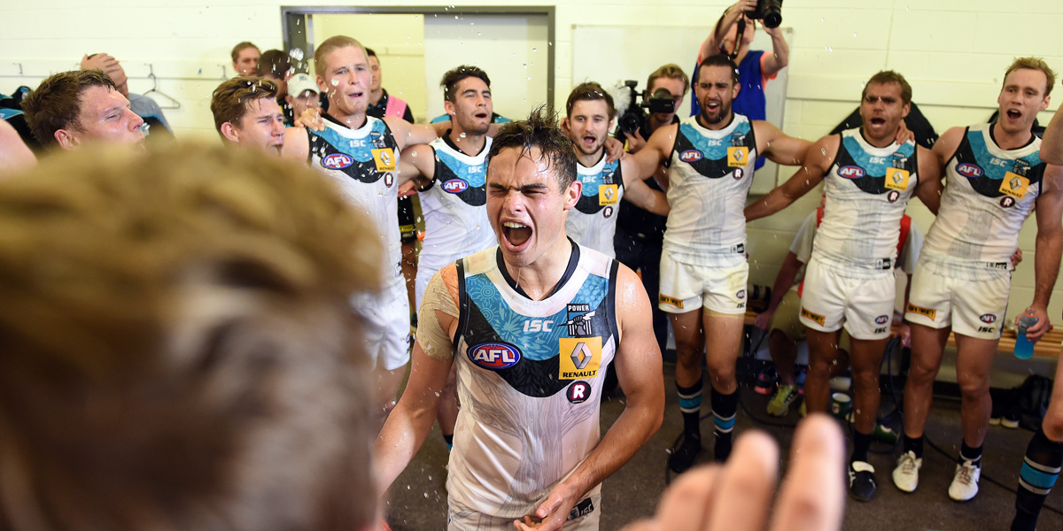 Young Power player Karl Amon gets a Gatorade shower after Port's victory against Melbourne. AAP photo