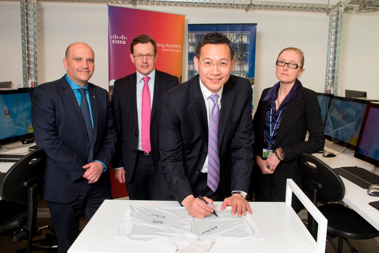 Cisco Academy takes off at Flinders: (from left) Professor Richard Constantine, Mr Ken Boal, Mr Irving Tan and Dr Anna Shillabeer.