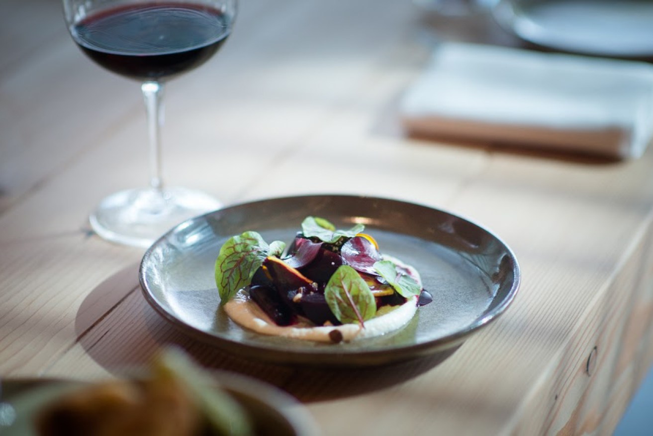 Roasted beetroot and a glass of Penfolds 2013 Bin 23 Pinot Noir. Photo: Nat Rogers/InDaily