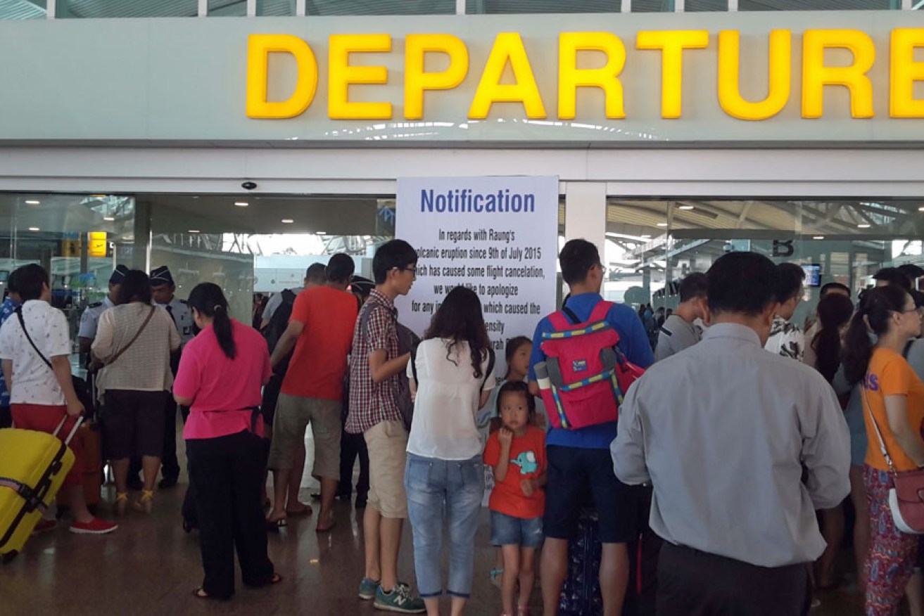 International passengers wait for their postponed flights at Ngurah Rai International Airport in Bali.