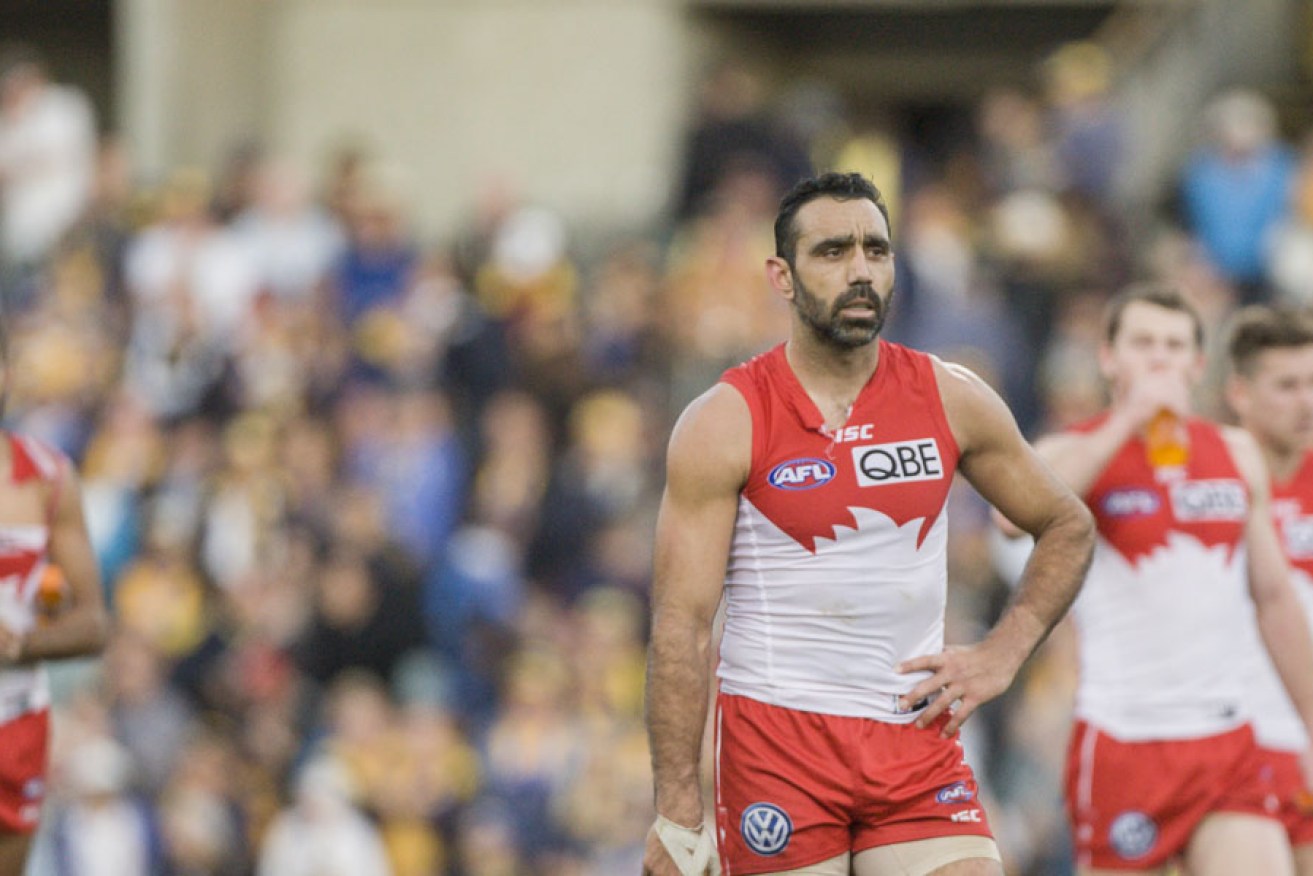 Adam Goodes leads his team from the field after the weekend's defeat. 