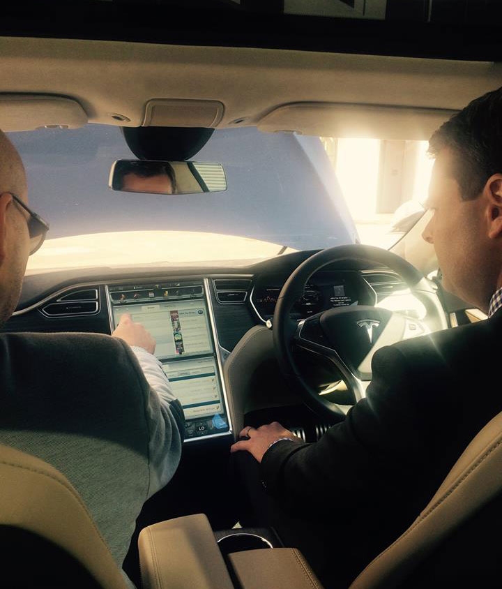 Transport Minister Stephen Mullighan in a Tesla car, with the capacity to drive autonomously. Supplied image 