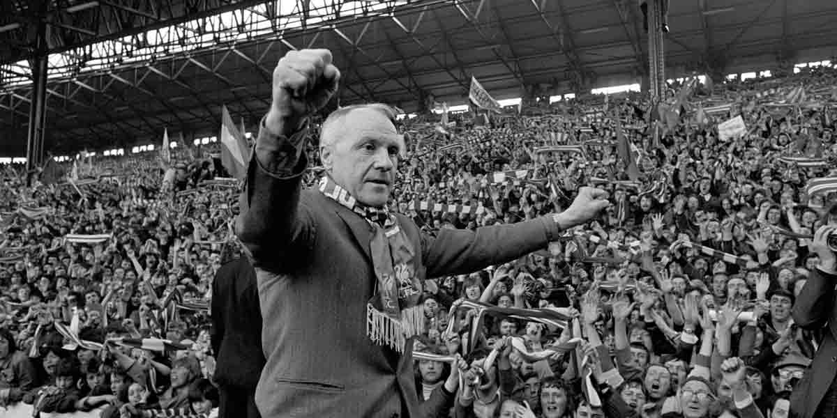 Liverpool manager Bill Shankly celebrating with fans at Anfield in April 1973. PA Wire image