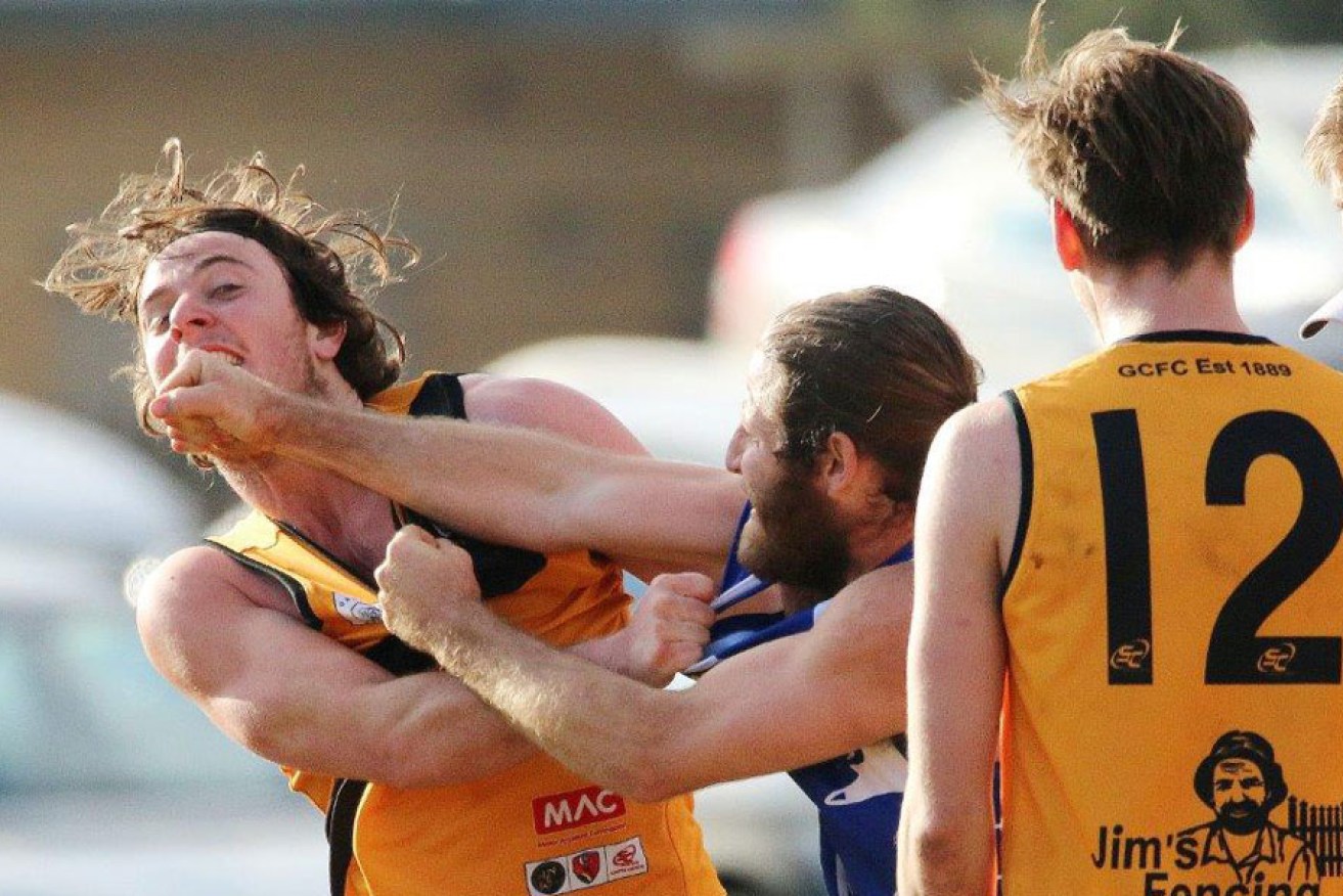 South Gawler's Ryan Appleton collects Gawler Central's Brad Hunt during the clash between the crosstown rivals last Saturday at Eldred Riggs Reserve. Photo: Peter Argent

