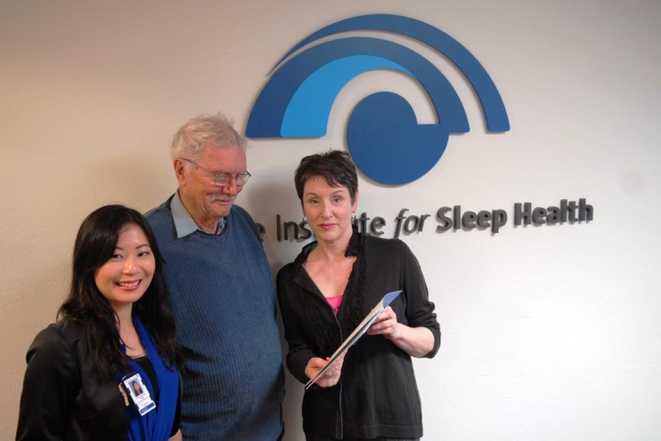 Carissa Yap, Advanced Trainee in Respiratory and Sleep from the Southern Adelaide Local Health Network, left, and Dr Harris - from  Flinders University's Human Behaviour and Health Research Unit which specialises in managing chronic diseases - consult a potential participant in the new sleep apnoea survey. 