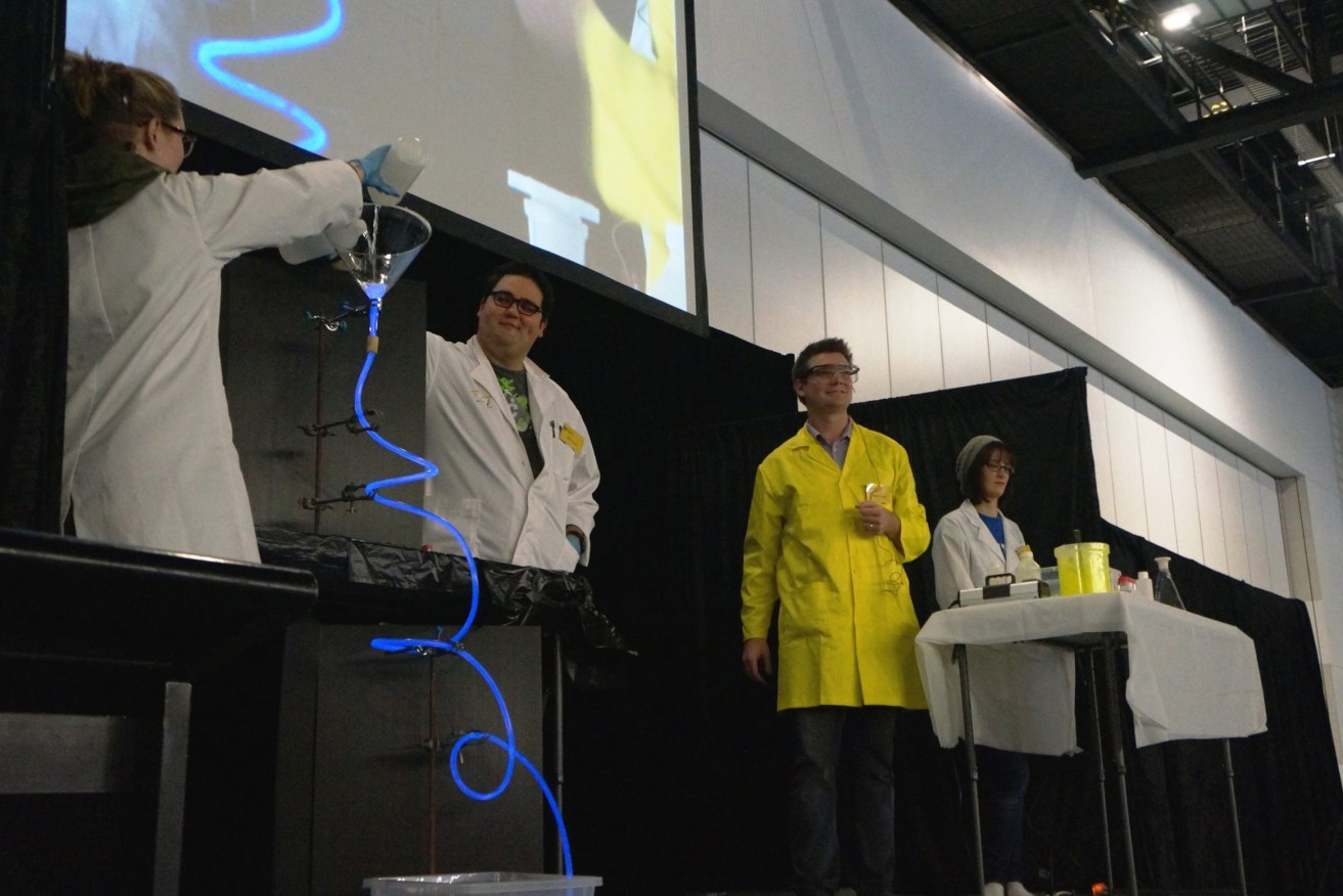 Dr Justin Chalker, centre, with some of this team of performing Flinders University scientists.