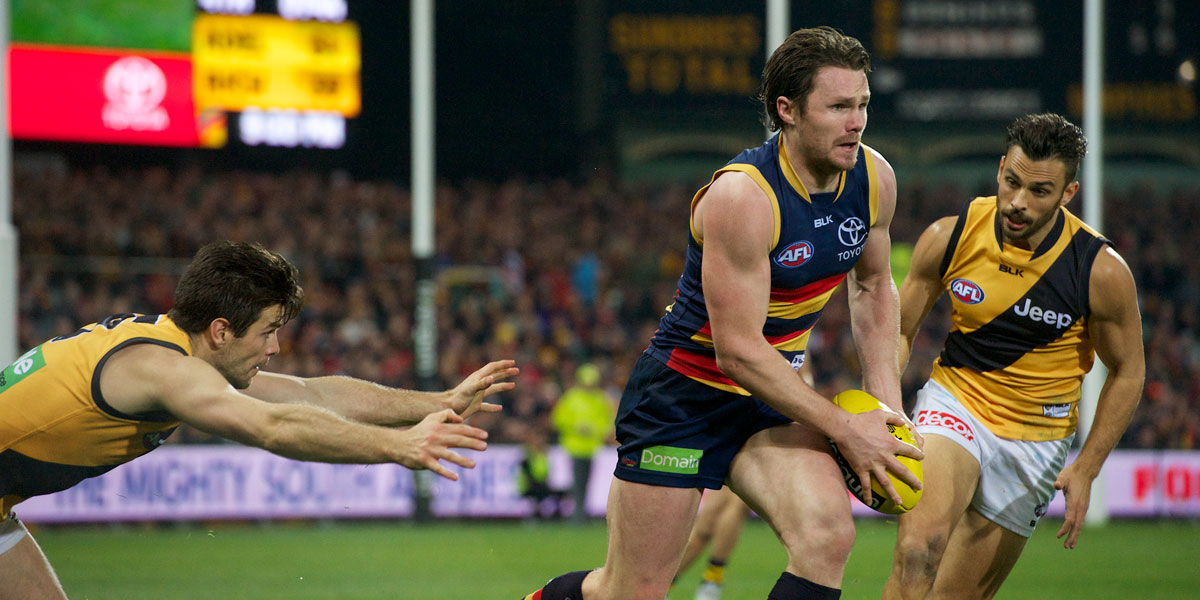 Richmond spent much of the game chasing Patrick Dangerfield. Photo: Michael Errey/InDaily