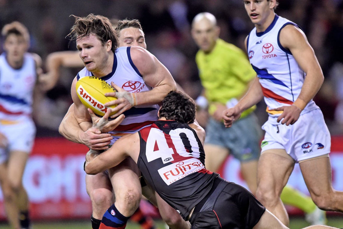 Patrick Dangerfield was rarely caught against Essendon on Saturday. AAP image