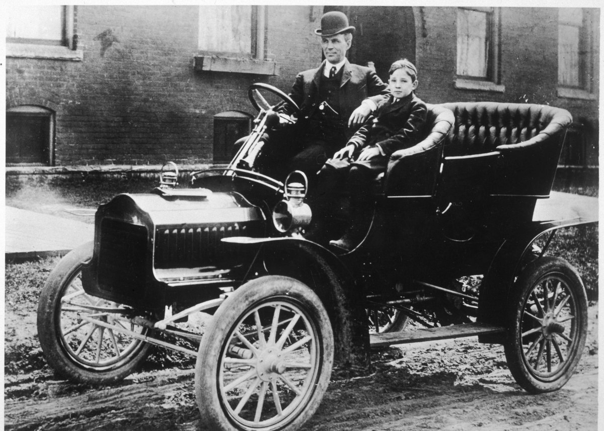 Henry Ford, with his son Edsel in a Model T, circa 1912. Photo: Mary Evans Picture Library 