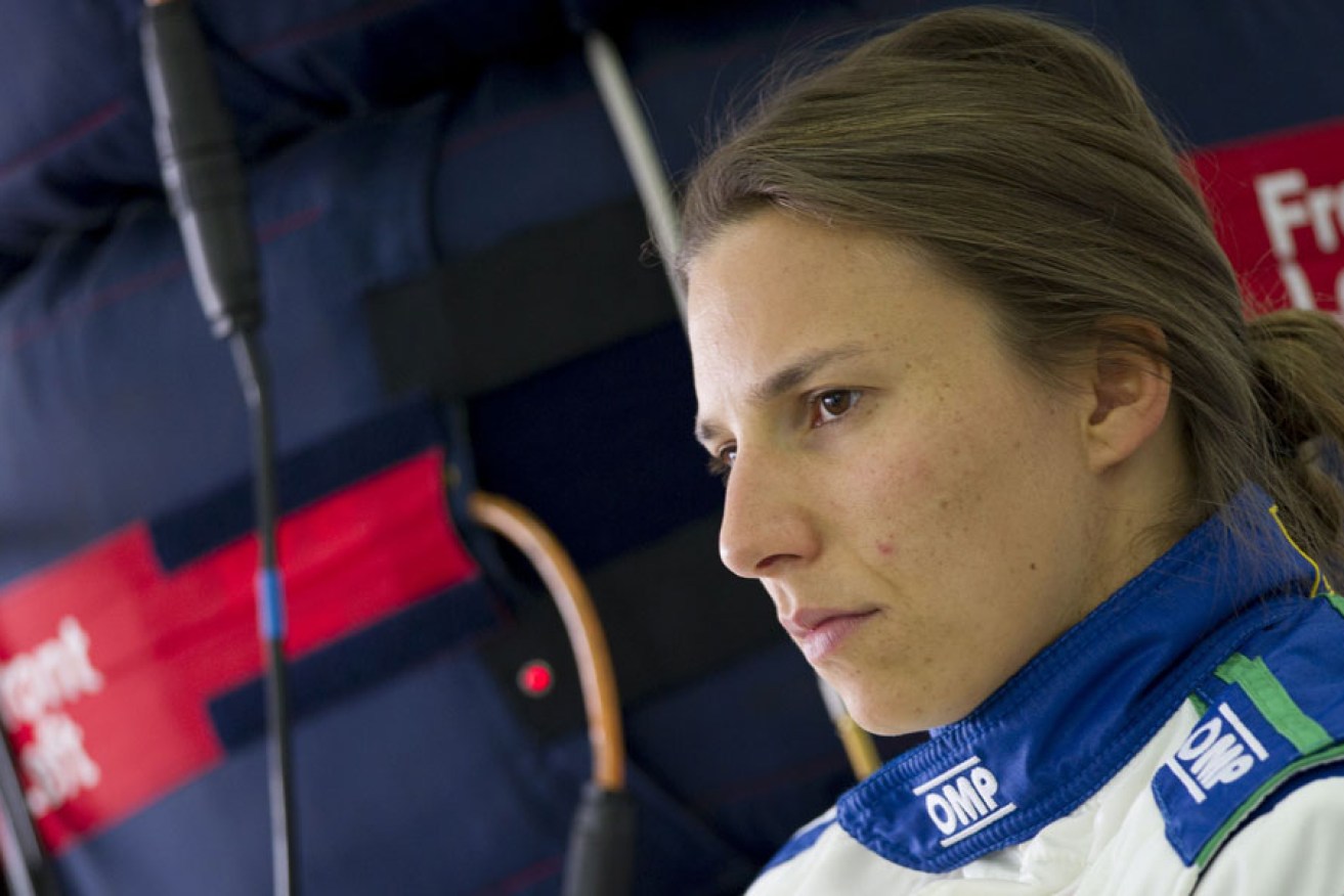 Simona de Silvestro speaks with mechanics during a private test with the Sauber F1 team in Valencia last year.