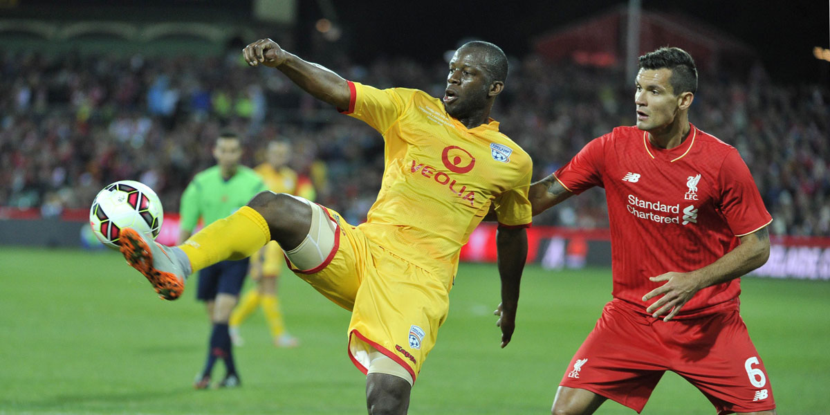 United wore an all yellow strip against Liverpool at Adelaide Oval. AFP image