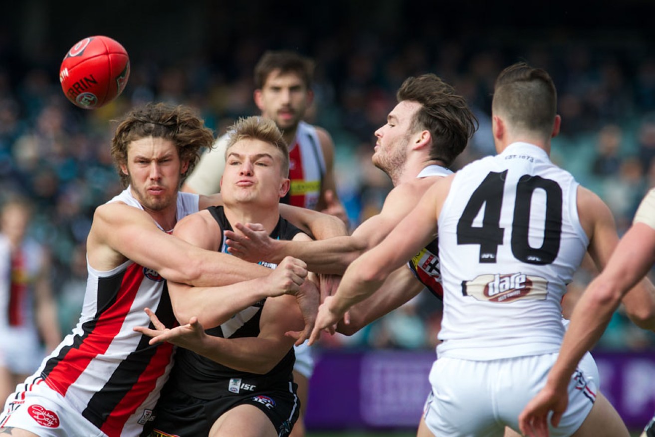 Port's Ollie Wines in the thick of the action before he was injured against St Kilda. Photo: Michael Errey/InDaily