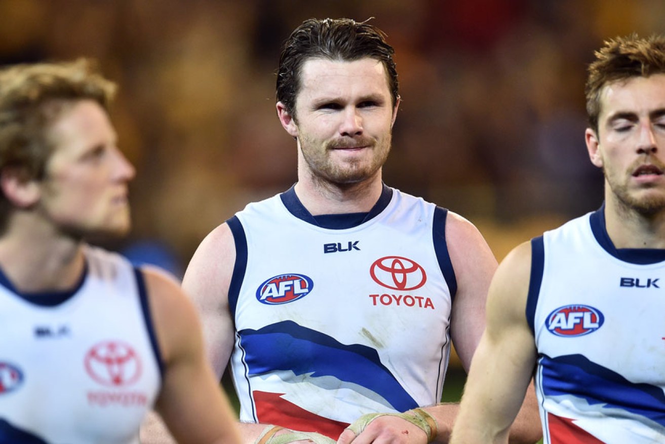 Patrick Dangerfield (centre) after Friday night's defeat. AAP image