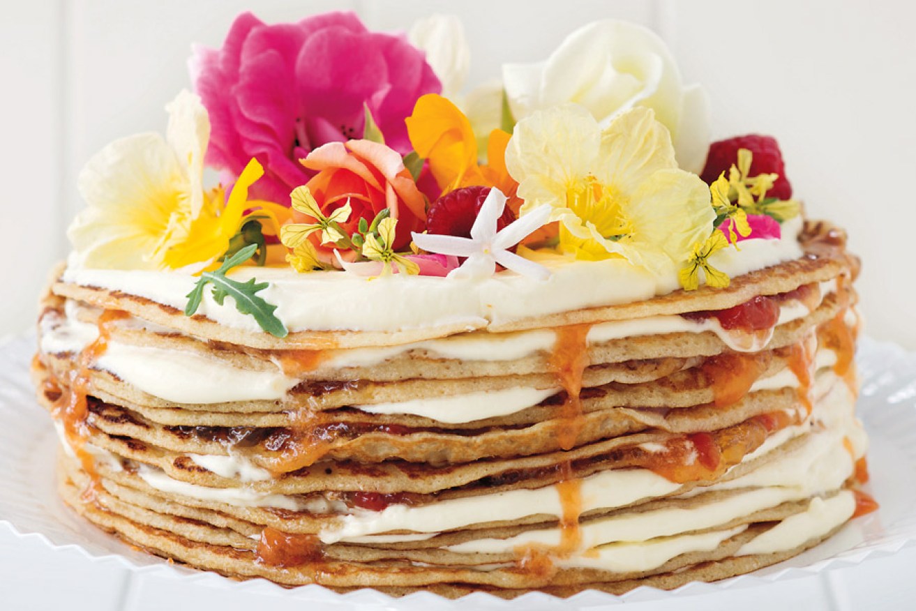 Layered crepe cake with watermelon and rose jam, chantilly cream and berries. Photo: Murdoch Books