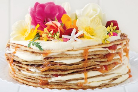 Layered crêpe cake with watermelon and rose jam