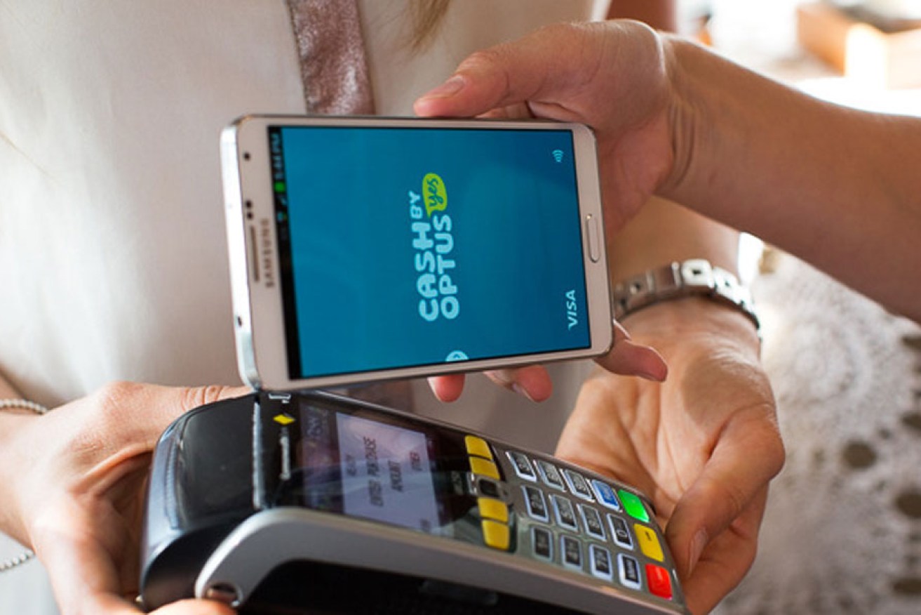 A customer using a smartphone app to "tap and pay". Supplied image