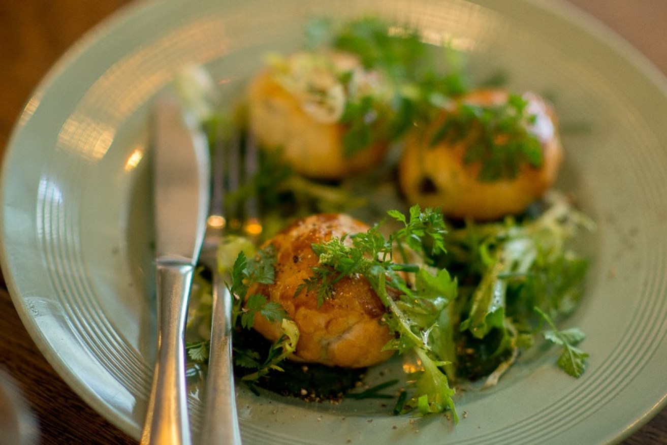 Escargot in puff pastry with garlic butter and parsley puree. Photo: Nat Rogers/InDaily