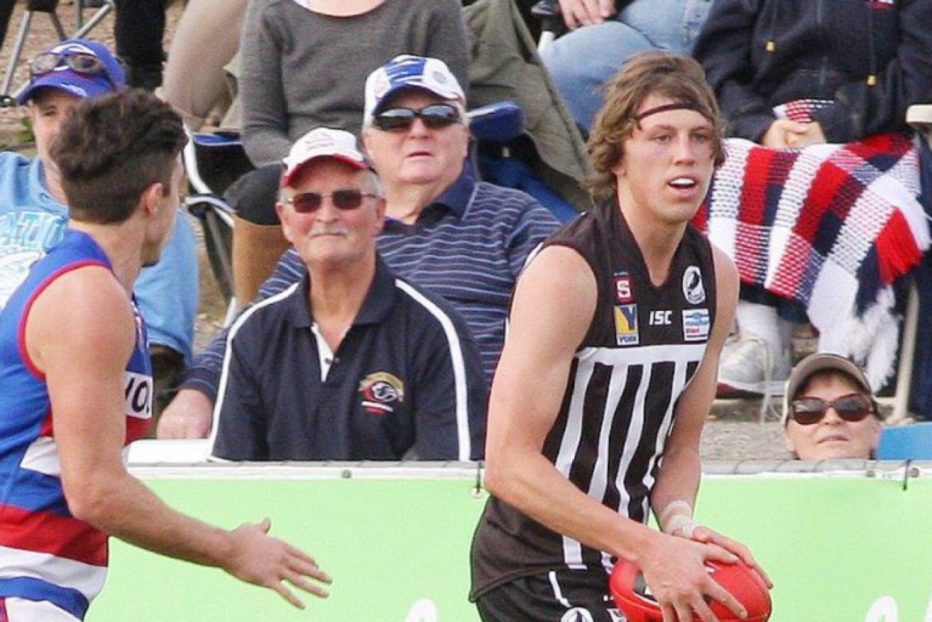 Luke Reynolds in action for the Magpies. Photo: Peter Argent