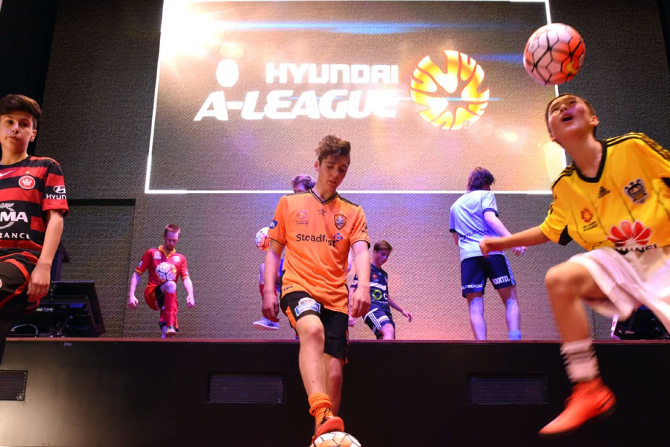 Young footballers during yesterday's launch of the A-League season. AAP image