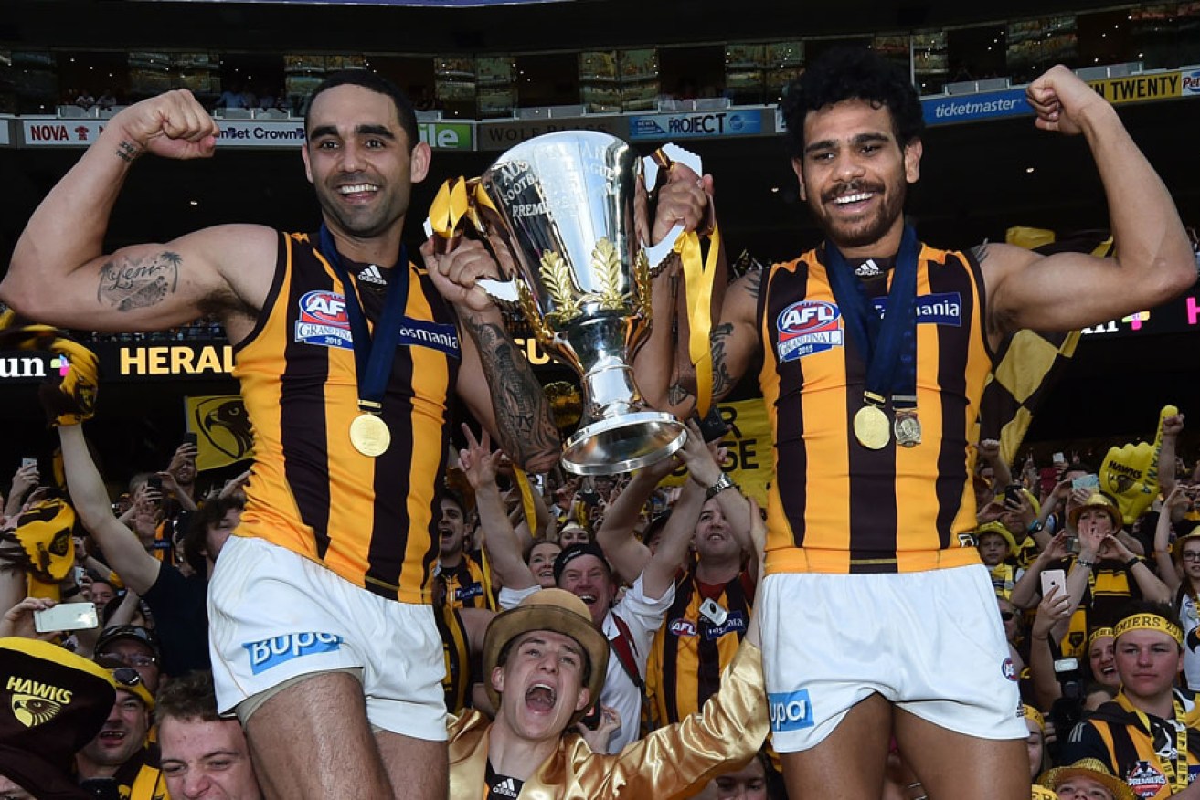 Shaun Burgoyne (left) was one of the quartet of South Australians who helped Hawthorn to victory on Saturday. AAP image 