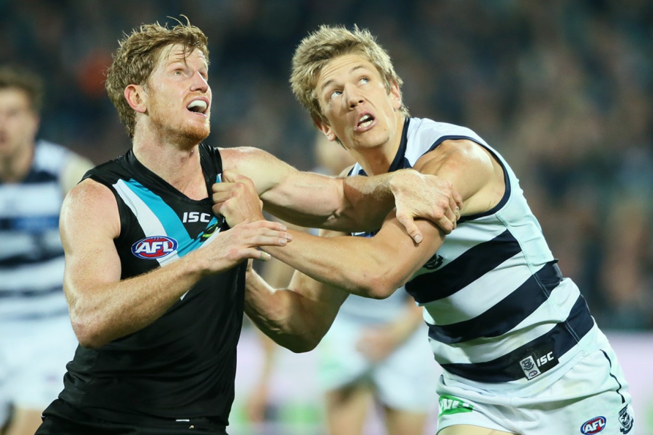 Matthew Lobbe grapples with Cat Rhys Stanley.