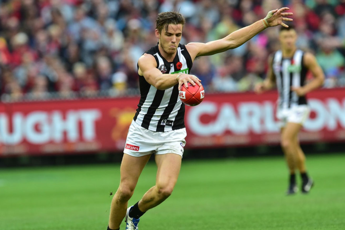 Magpie Paul Seedsman will join Adelaide as part of a complex four-club deal. AAP image