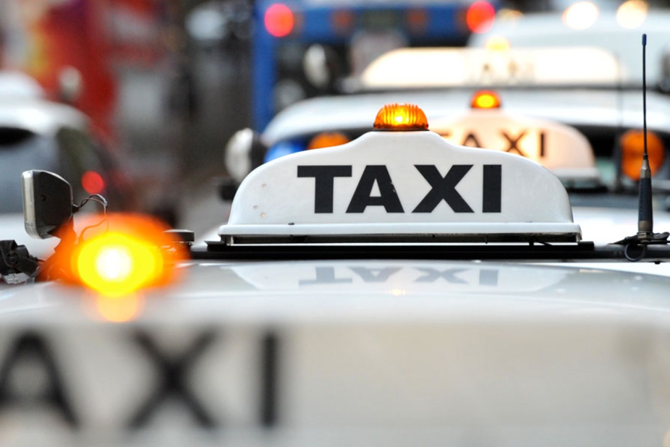 Customer service offered by Australian taxis is "unresponsive" and "outmoded". AAP image