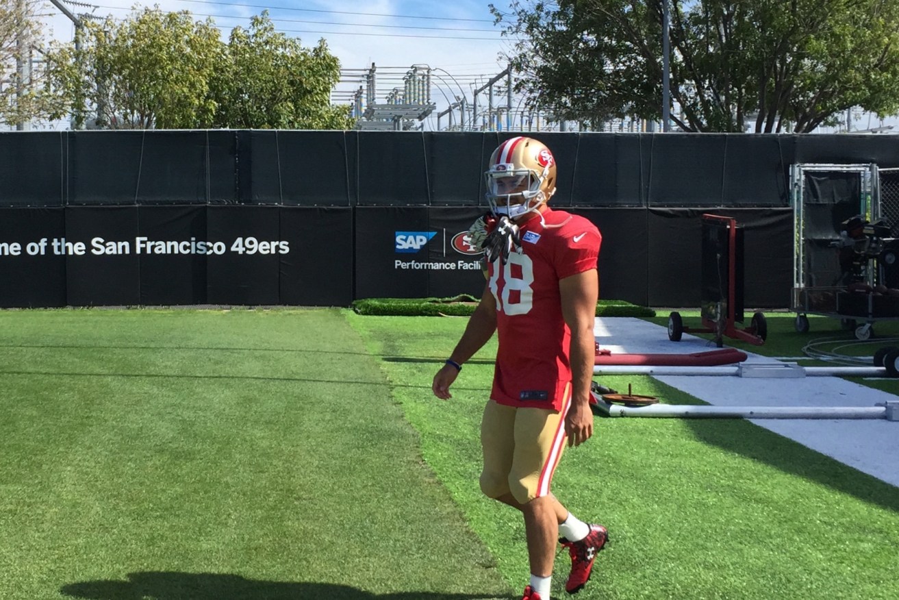 Jarryd Hayne walks onto the field ahead for a practice game with the 49ers.