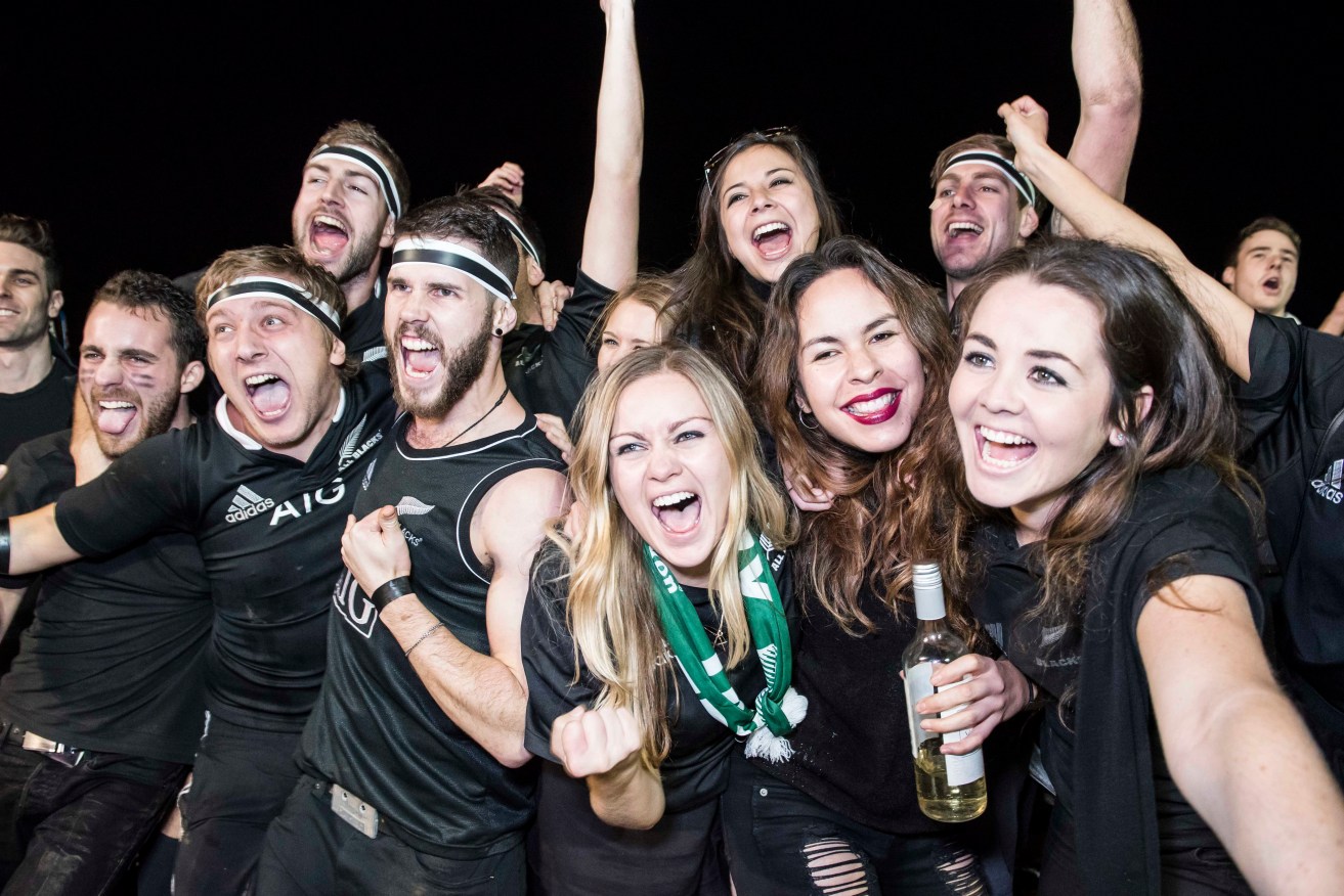 New Zealand Rugby Fans in London celebrate winning the Rugby World Cup.