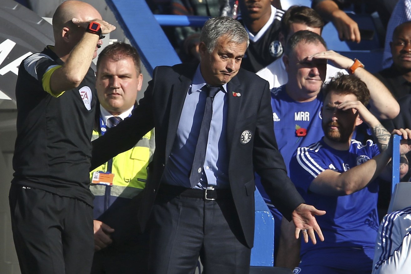 Mourinho gestures during the weekend's EPL match against Liverpool at Stamford Bridge, which Chelsea lost 3-1.