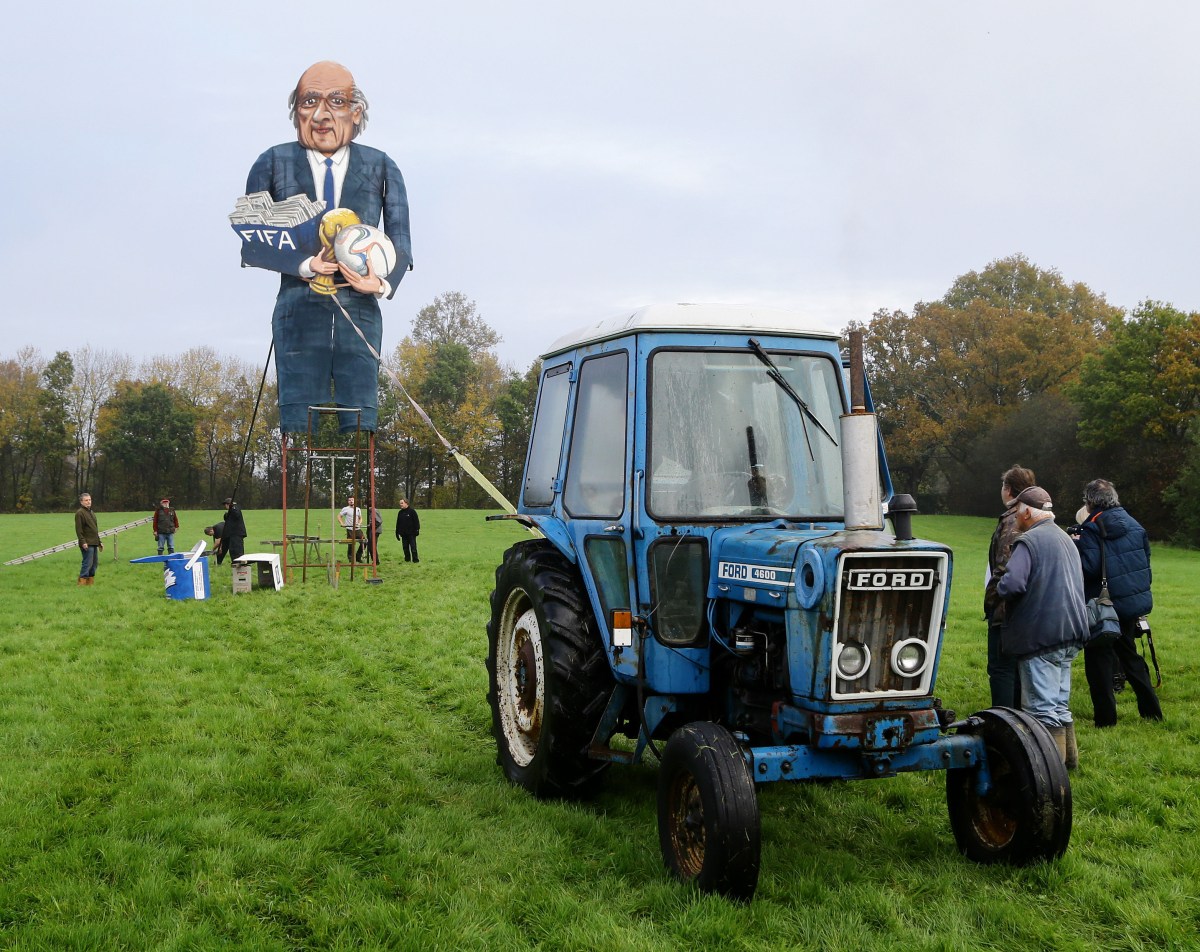 STRAW MAN ARGUMENT: Members of the Edenbridge Bonfire Society put the final touches to their Sepp Blatter effigy.
