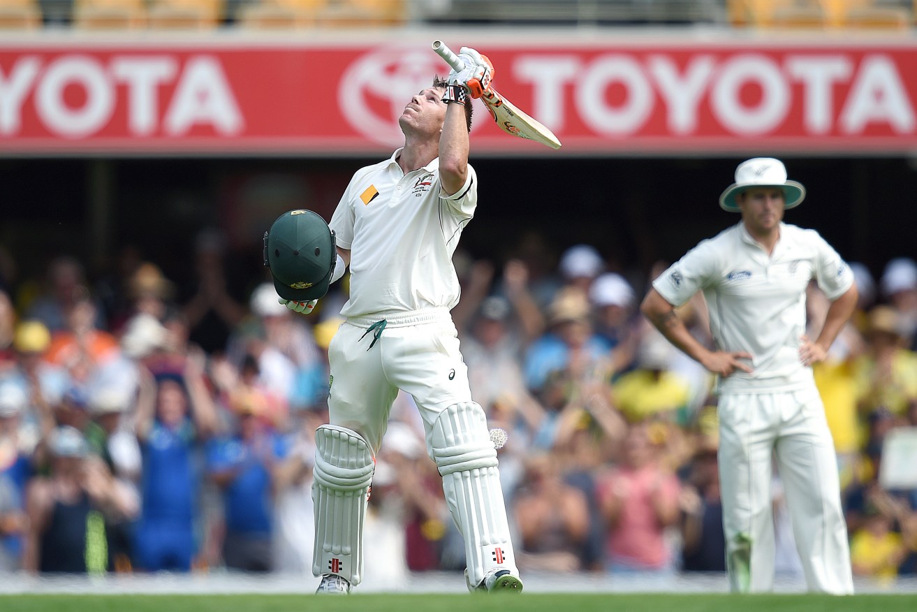 David Warner looks to the sky as he reacts to scoring a century on day one of the first Trans-Tasman Test.