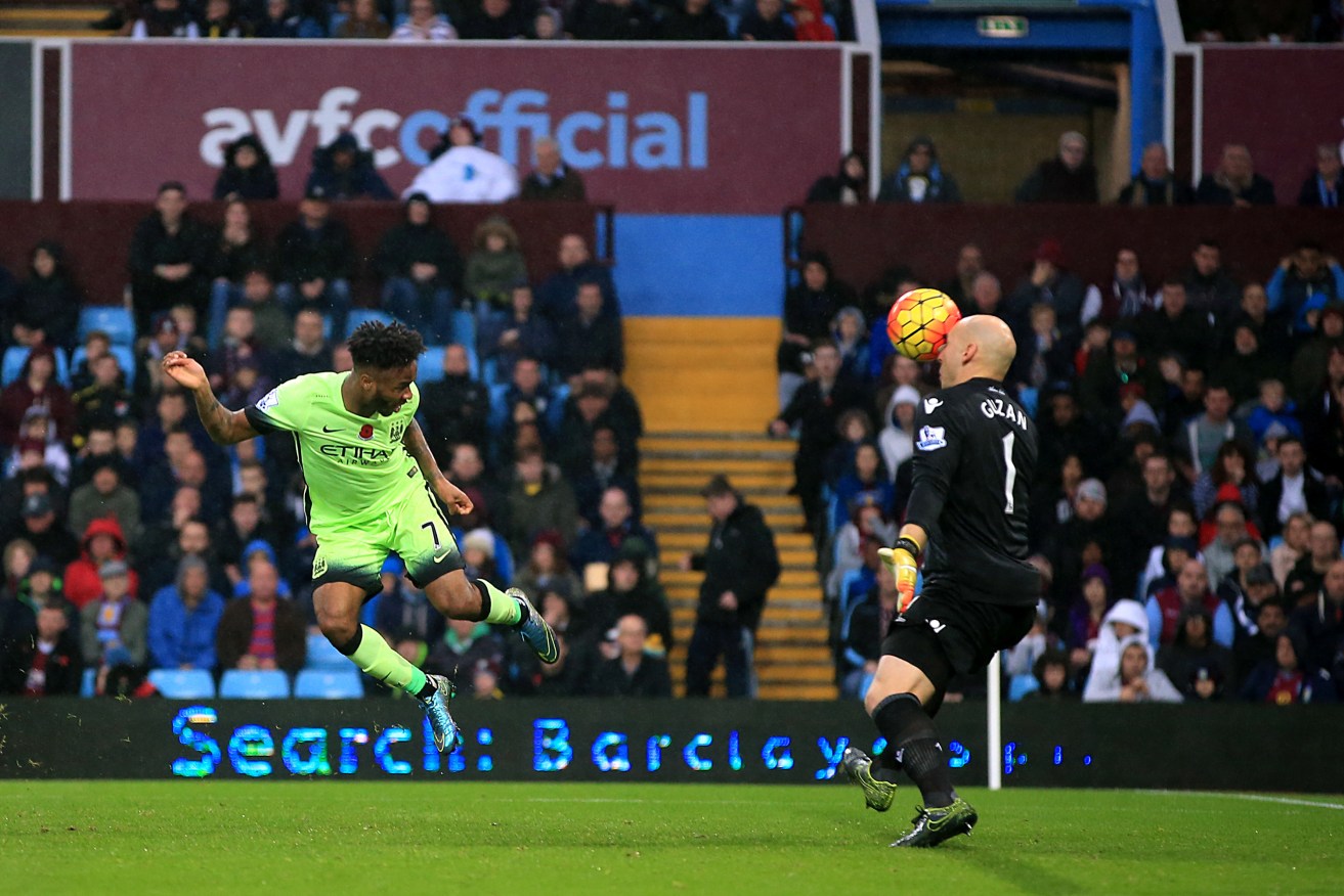 Manchester City's Raheem Sterling has his header saved by Aston Villa goalkeeper Brad Guzan.
