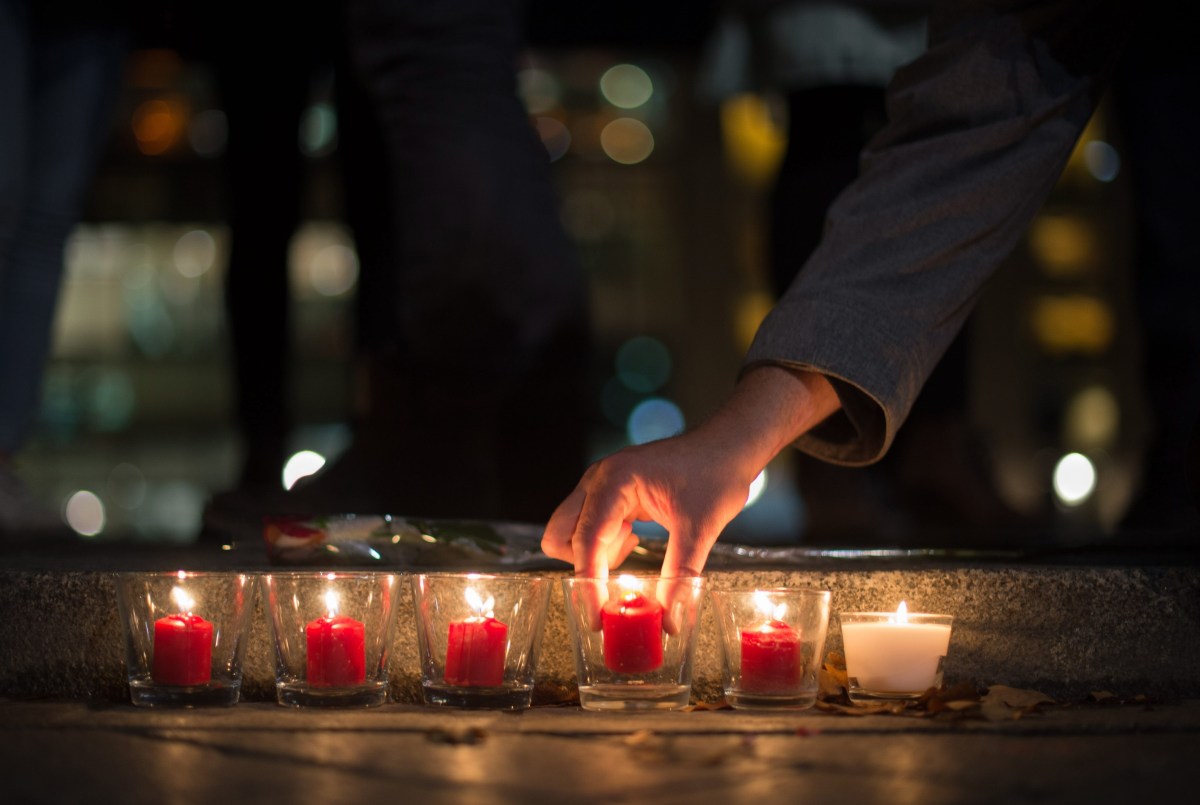 Candles lit in tribute to the victims of the Paris attacks, outside the French embassy in Berlin.