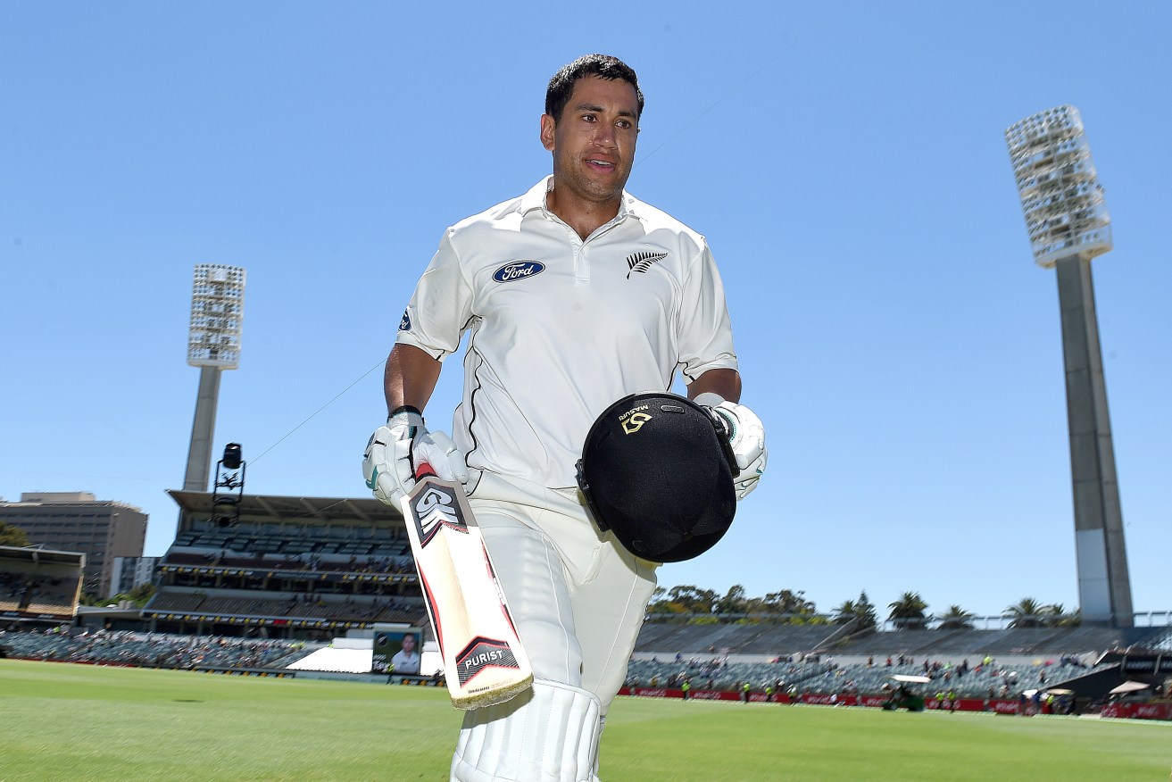 New Zealand batsman Ross Taylor leaves the field after scoring a record 290 runs. AAP Image/Dave Hunt