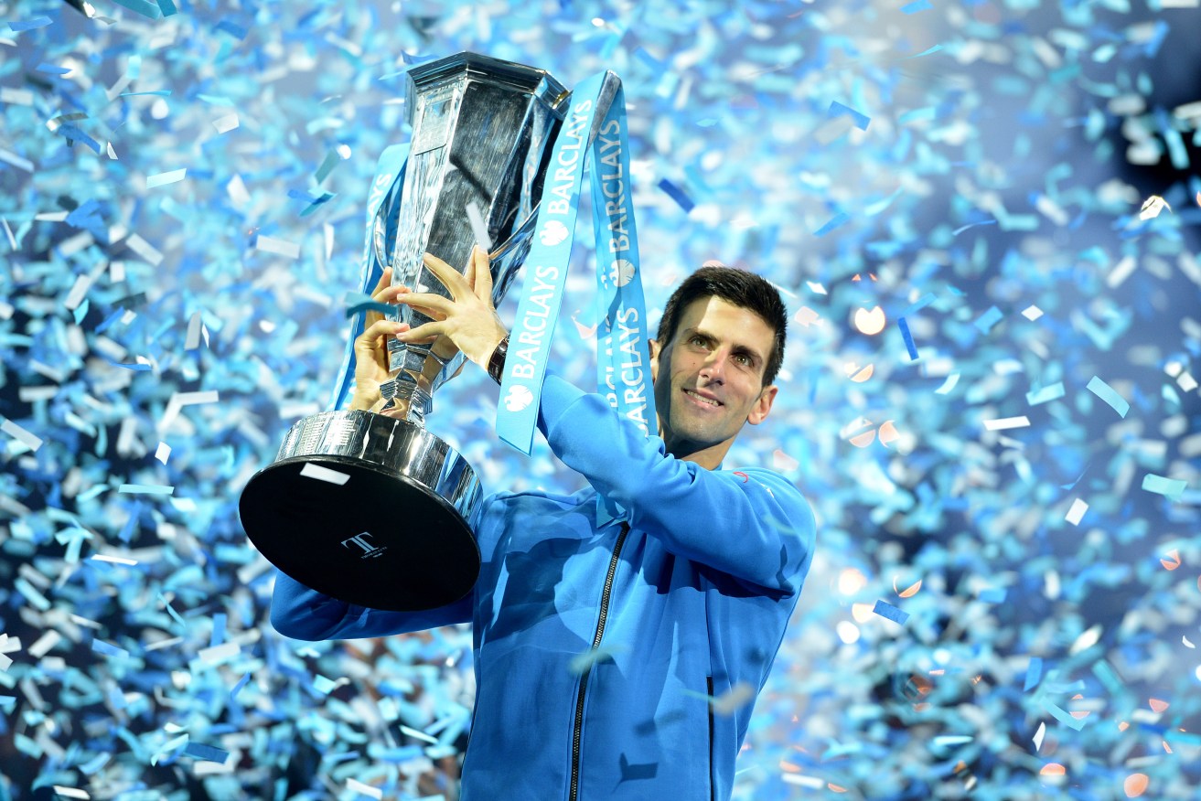 Novak Djokovic celebrates winning the Final of the ATP World Tour Finals at the O2 Arena, London. Photo:  Adam Davy/PA Wire