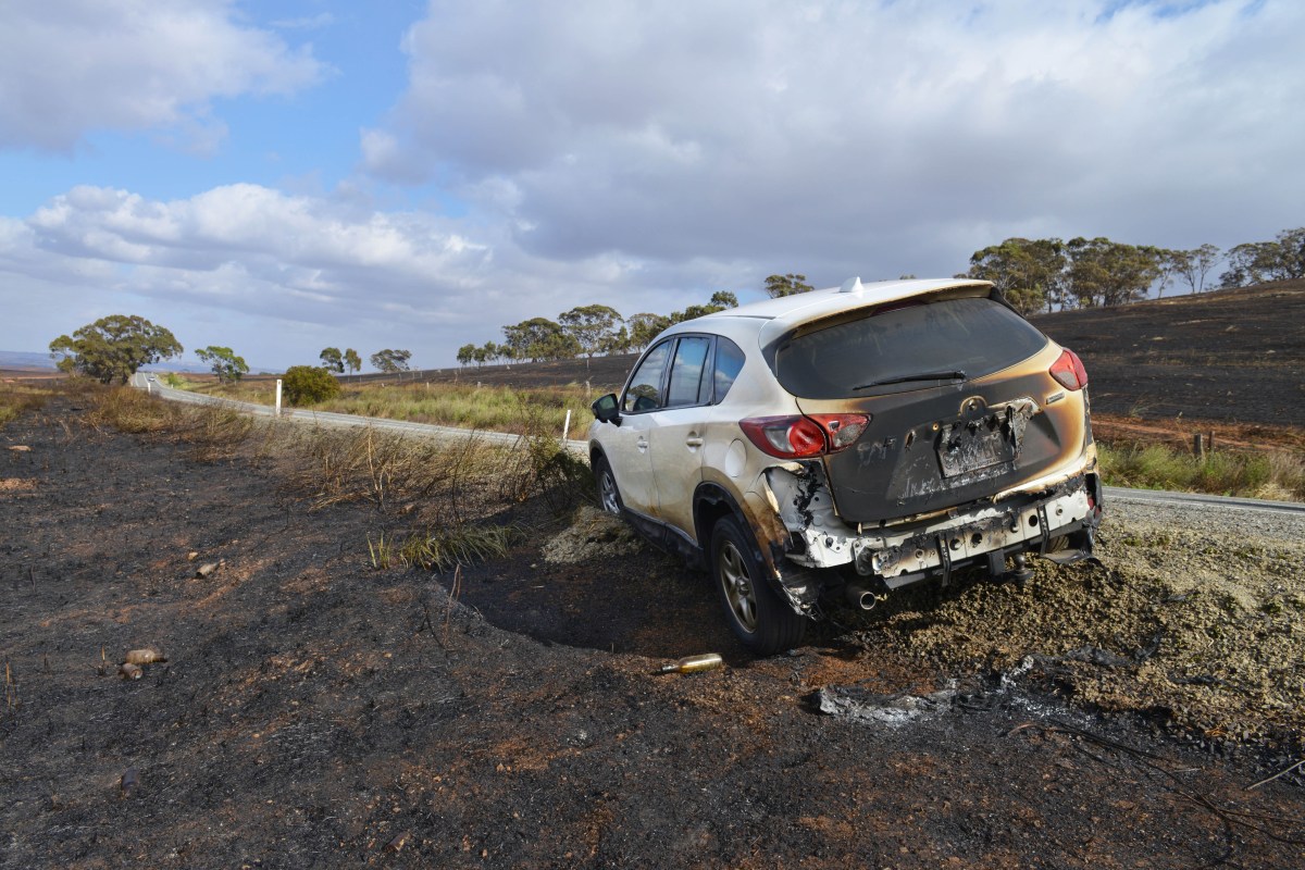 A destroyed car, one of dozens caught in the path of the Pinery fire. AAP Image/Brenton Edwards
