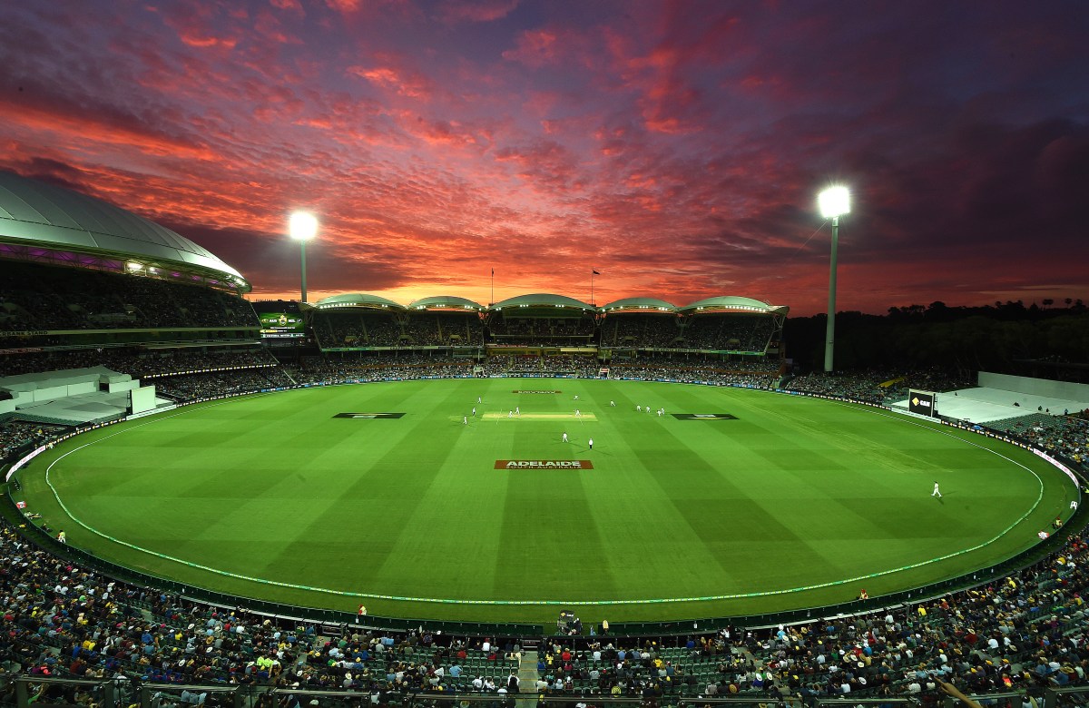 The sun sets over the first day-night Test, hosted at Adelaide Oval. Photo: Dave Hunt / AAP