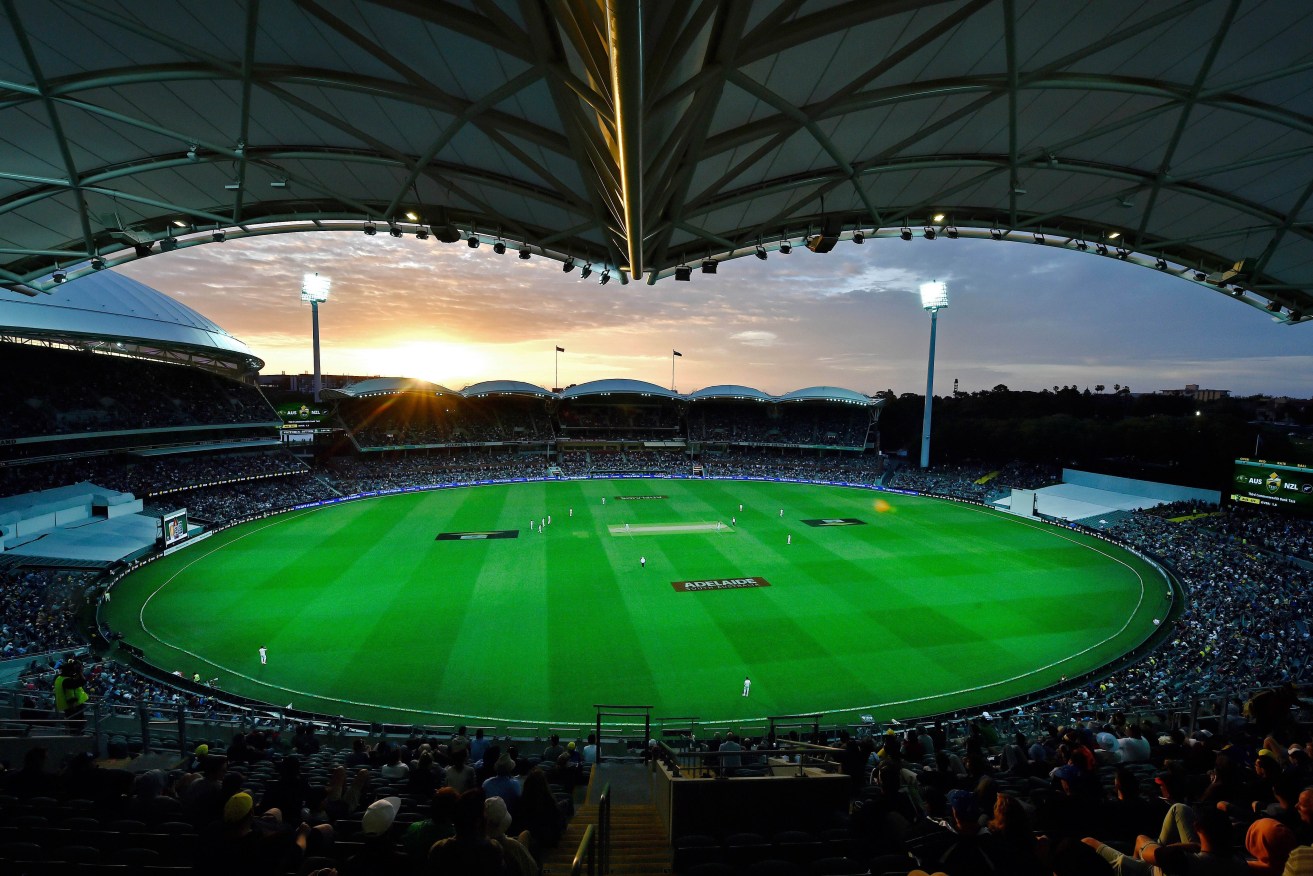 The sun sets over the Adelaide Oval. AFP PHOTO / SAEED KHAN