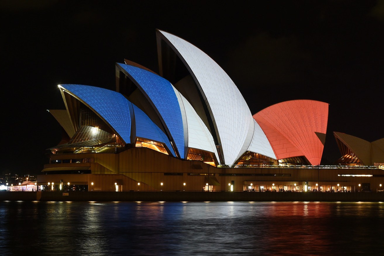 Sydney Opera House is illuminated in the colours of the French flag in a display of solidarity after the attacks on Paris. AAP/Dan Himbrechts
